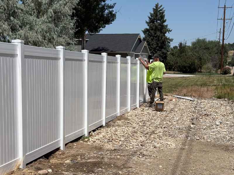 professional installation of vinyl fence - Heartland Fence & Post